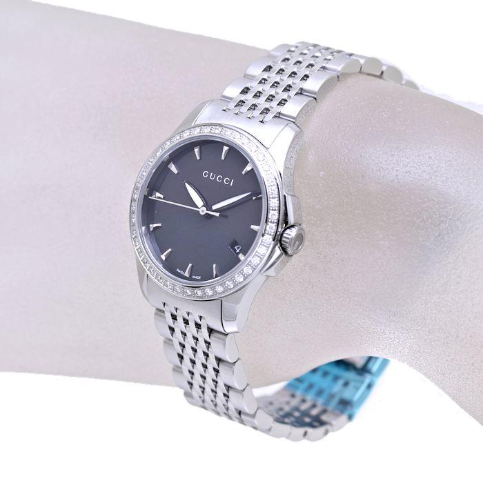  Shop Authentic Gucci G Timeless Diamonds Mother of Pearl Black Dial Silver Mesh Bracelet Watch For Women - YA126507 - Luxxuri