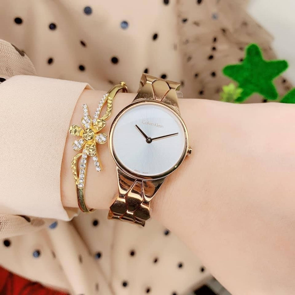  Shop Authentic Calvin Klein Snake Silver Dial Yellow Gold Steel Strap Watch For Women - K6E23546 - Luxxuri