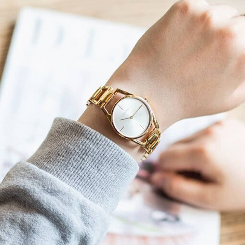  Shop Authentic Calvin Klein Dainty White Dial Gold Steel Strap Watch for Women - K7L23546 - Luxxuri
