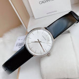  Shop Authentic Calvin Klein High Noon Quartz White Dial Black Leather Strap Watch for Men - K8M211C6 - Luxxuri