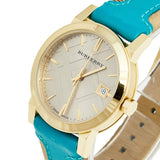  Shop Authentic Burberry The City Gold Dial Blue Leather Strap Watch for Women - BU9018 - Luxxuri