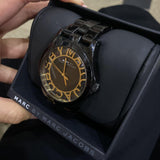 Shop Authentic Marc Jacobs Henry Transparent Black Dial Black Steel Strap Watch for Women - MBM3255 - Luxxuri