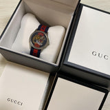  Shop Authentic Gucci G Timless Le Marche Des Merveilles Blue & Red Dial Blue & Red Nylon Strap Unisex Watch  - YA126495 - Luxxuri