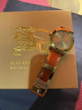  Shop Authentic Burberry The City Gold Dial Orange Leather Strap Watch for Women - BU9016 - Luxxuri
