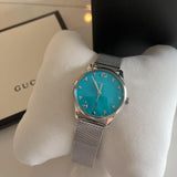  Shop Authentic Gucci G-Timeless Turquiose Mother of Pearl Dial Silver Mesh Bracelet Watch For Women - YA1264039 - Luxxuri