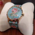  Shop Authentic Gucci G Timeless Floral Turquoise Dial Turquoise Leather Strap Watch For Women - YA1264085 - Luxxuri