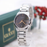  Shop Authentic Gucci G Timeless Brown Dial Silver Steel Strap Watch For Women - YA126529 - Luxxuri