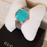  Shop Authentic Gucci G-Timeless Turquoise Mother of Pearl Dial Silver Mesh Bracelet Watch For Women - YA126582 - Luxxuri