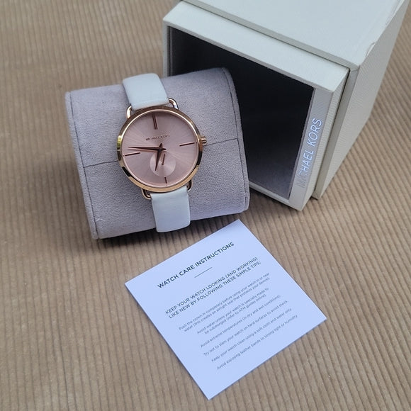  Shop Authentic Michael Kors Portia Rose Gold Dial White Leather Strap Watch For Women - MK2660 - Luxxuri