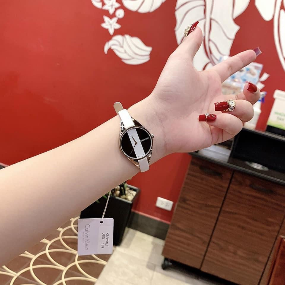  Shop Authentic Calvin Klein Rebel White Black Dial White Leather Strap Watch for Women - K8P231L1 - Luxxuri