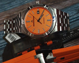  Shop Authentic Maurice Lacroix Aikon Automatic Date Orange Dial Silver Steel Strap Watch For Men - AI6008-SS00F-530-E - Luxxuri