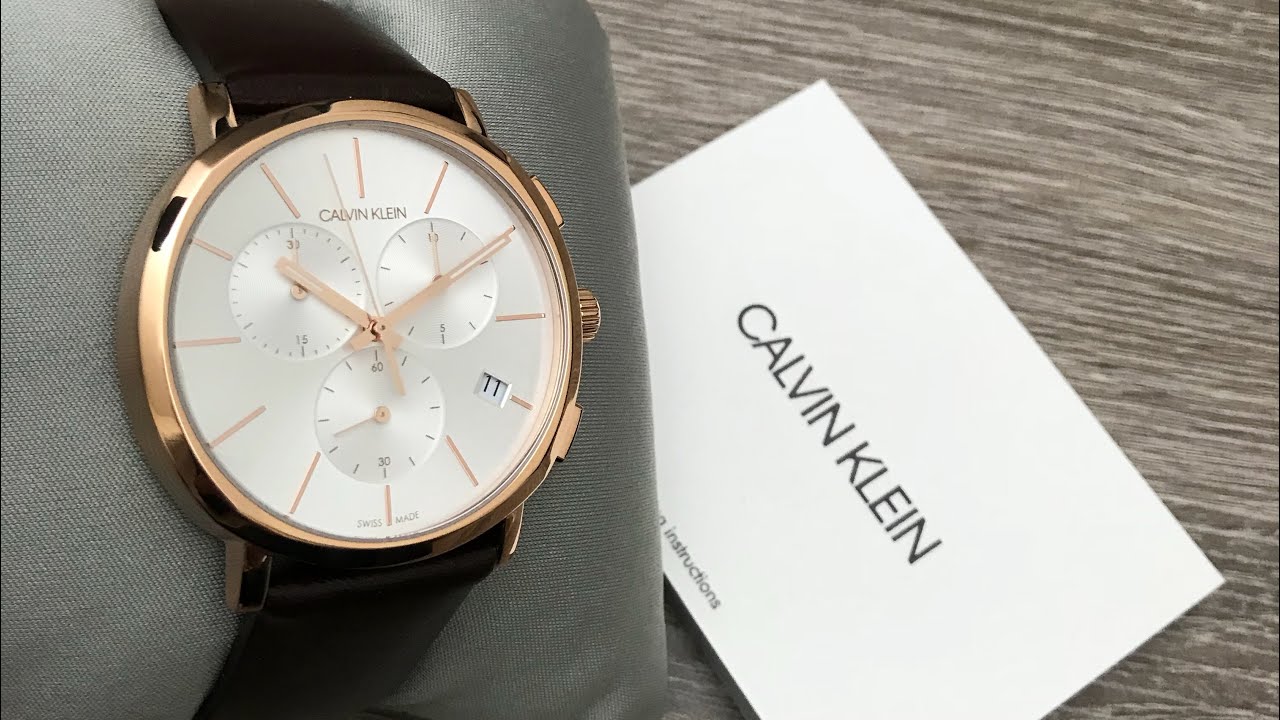  Shop Authentic Calvin Klein Posh Chronograph White Dial Brown Leather Strap Watch for Men - K8Q376G6 - Luxxuri