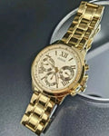  Shop Authentic Guess Sunrise Chronograph Gold Dial Gold Steel Strap Watch For Women - W0330L1 - Luxxuri