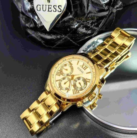  Shop Authentic Guess Sunrise Chronograph Gold Dial Gold Steel Strap Watch For Women - W0330L1 - Luxxuri