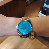  Shop Authentic Michael Kors Slim Runway Blue Mother of Pearl Dial Gold Steel Strap Watch for Women - MK3492 - Luxxuri