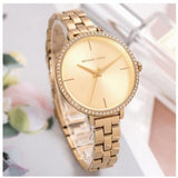  Shop Authentic Michael Kors Charley Three-Hand Quartz Gold Dial Gold Steel Strap Watch for Women - MK4399 - Luxxuri