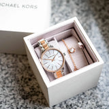  Shop Authentic Michael Kors Pyper Quartz Mother of Pearl White Dial Two Tone Steel Strap Watch For Women - MK1066 - Luxxuri