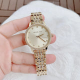  Shop Authentic Michael Kors Melissa Quartz Gold Dial Gold Steel Strap Watch for Women - MK4368 - Luxxuri