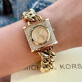  Shop Authentic Michael Kors Chain Lock Pave Gold Dial Gold Steel Strap Watch For Women - MK4711 - Luxxuri