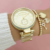  Shop Authentic Michael Kors Skylar Gold Dial Gold Steel Strap Watch for Women - MK5867 - Luxxuri