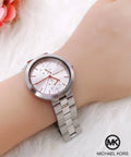  Shop Authentic Michael Kors Garner Analog Silver Dial Silver Steel Strap Watch For Women - MK6407 - Luxxuri