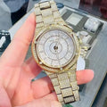  Shop Authentic Michael Kors Lennox Three Hand Crystals White Dial Gold Steel Strap Watch For Women - MK6991 - Luxxuri