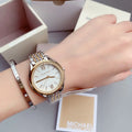  Shop Authentic Michael Kors Mindy Three Hand White Dial Two Tone Steel Strap Watch For Women - MK7084 - Luxxuri