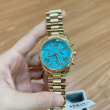  Shop Authentic Michael Kors Lexington Chronograph Blue Dial Gold Steel Strap Watch For Women - MK7216 - Luxxuri