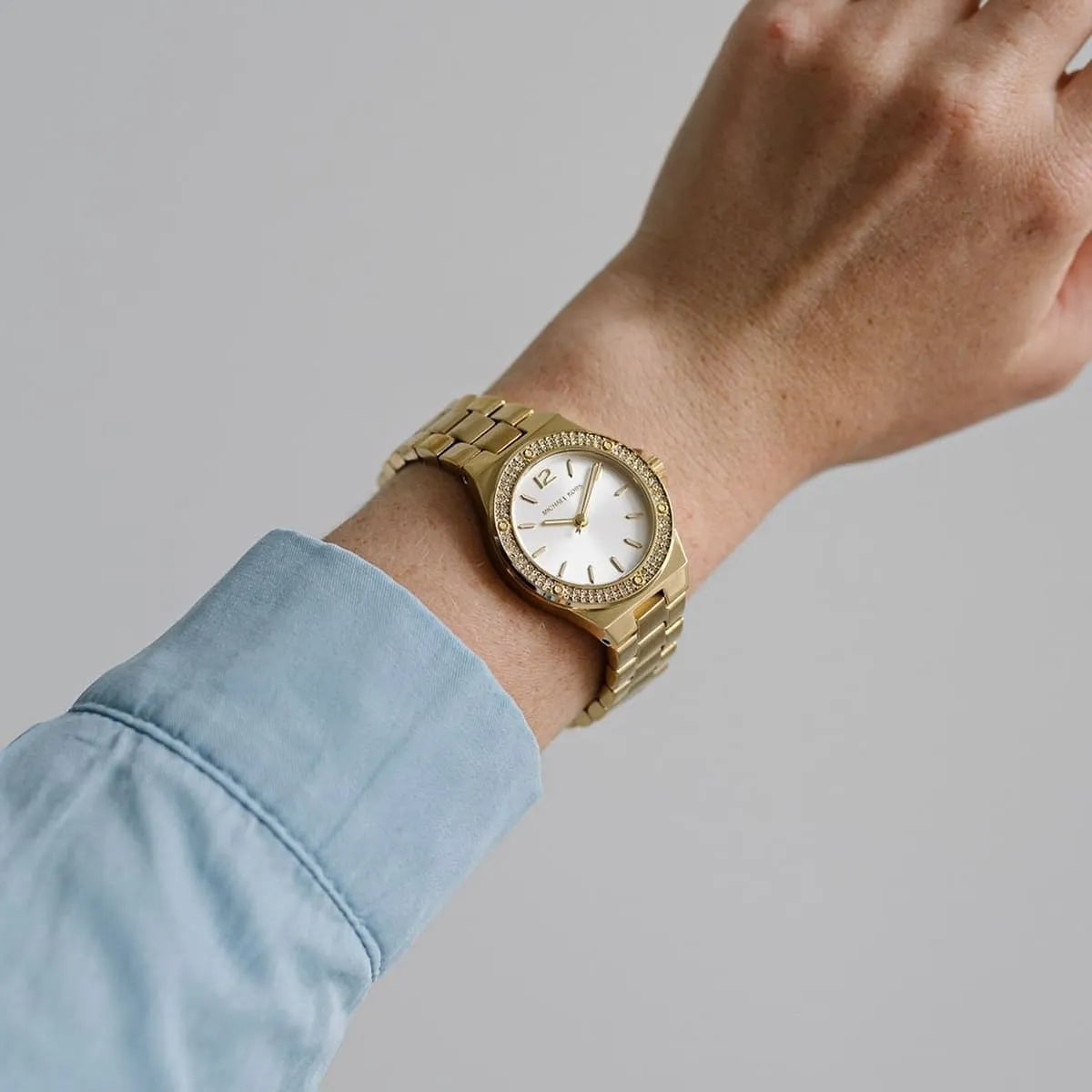  Shop Authentic Michael Kors Lennox Three-Hand Silver Dial Gold Steel Strap Watch For Women - MK7278 - Luxxuri