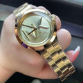  Shop Authentic Michael Kors Bryn Quartz Gold Dial Gold Steel Strap Watch For Women - MK7317 - Luxxuri