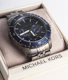  Shop Authentic Michael Kors Chronograph Cunningham Multifunction Blue Dial Grey Steel Strap Watch For Men - MK7155 - Luxxuri