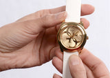  Shop Authentic Guess G-Twist Gold Dial White Rubber Strap Watch for Women - W0911L7 - Luxxuri