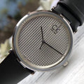  Shop Authentic Calvin Klein Sight Silver Dial Black Leather Strap Watch for Men - K1S21120 - Luxxuri