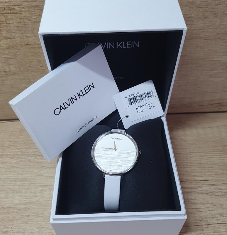  Shop Authentic Calvin Klein Rise White Grey Dial White Leather Strap Watch for Women - K7A231L6 - Luxxuri