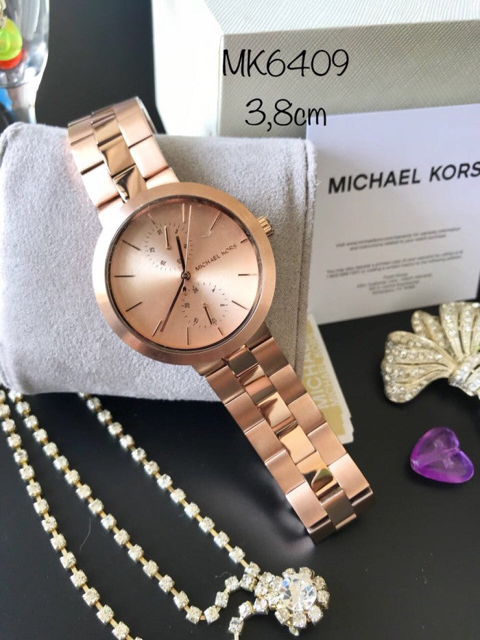  Shop Authentic Michael Kors Garner Quartz Rose Gold Dial Rose Gold Steel Strap Watch For Women - MK6409 - Luxxuri