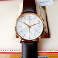  Shop Authentic Calvin Klein Posh Chronograph White Dial Brown Leather Strap Watch for Men - K8Q376G6 - Luxxuri
