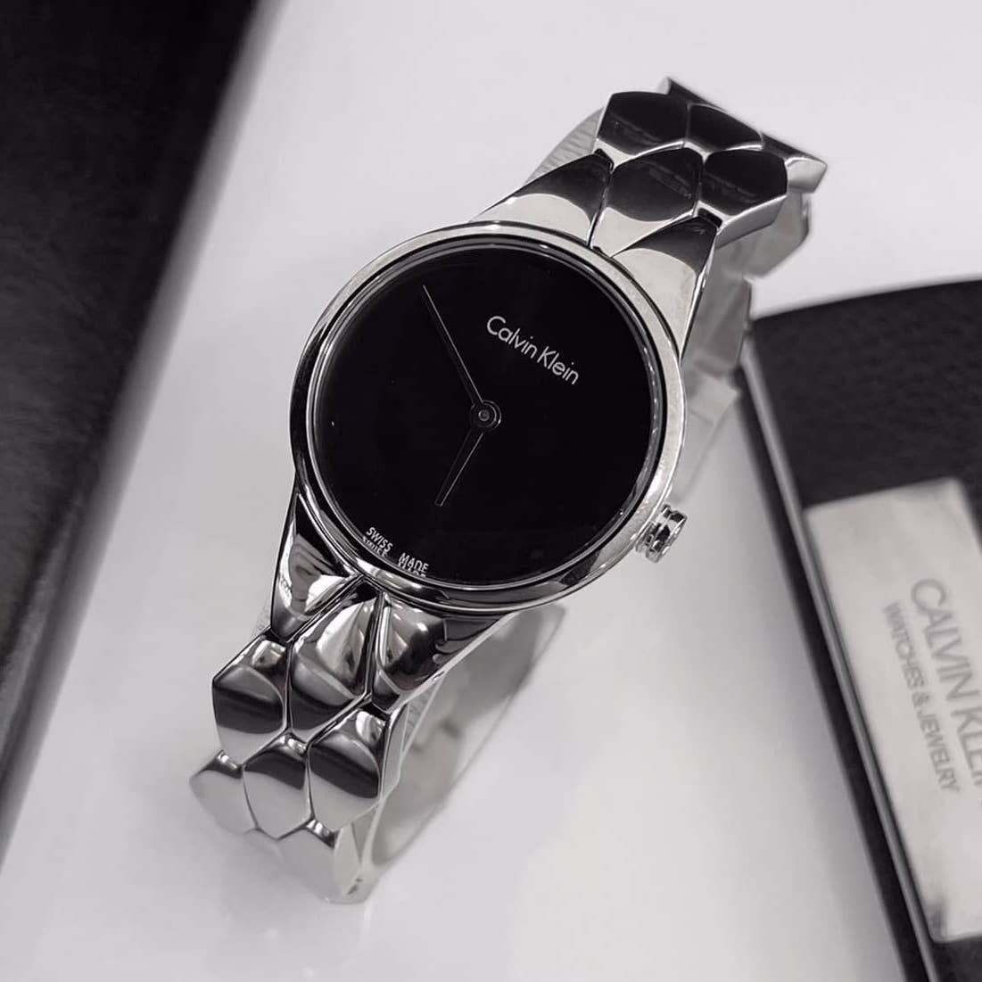  Shop Authentic Calvin Klein Snake Black Dial Silver Steel Strap Watch For Women - K6E23141 - Luxxuri