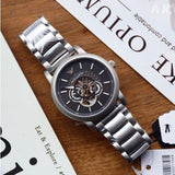  Shop Authentic Emporio Armani Meccanico Automatic Skeleton Black Dial Silver Steel Strap Watch For Men - AR60021 - Luxxuri