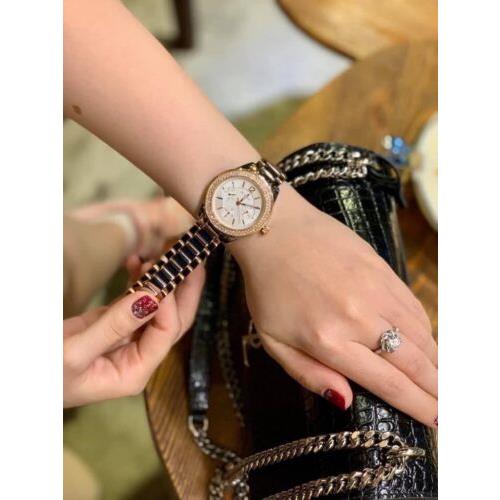  Shop Authentic Bulova Crystal Collection Silver Dial Two Tone Steel Strap Watch for Women - 98N100 - Luxxuri