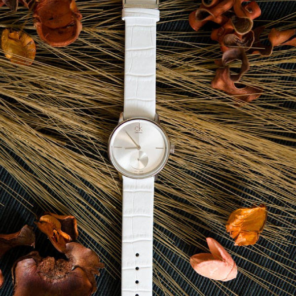  Shop Authentic Calvin Klein Accent Silver Dial White Leather Strap Watch for Women - K2Y231K6 - Luxxuri