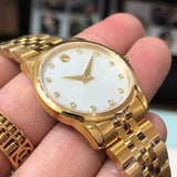 Shop Authentic Movado Museum Classic Diamonds Mother of Pearl Dial Gold Steel Strap Watch For Women - 0606998 - Luxxuri