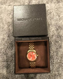  Shop Authentic Michael Kors Lexington Quartz Orange Dial Gold Steel Strap Watch For Women - MK3284 - Luxxuri