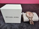  Shop Authentic Michael Kors Layton Multifunction Crystals Rose Gold Dial Rose Gold Steel Strap Watch for Women - MK4654 - Luxxuri