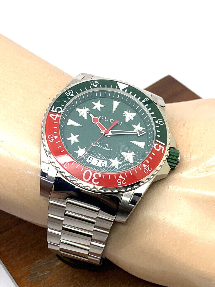  Shop Authentic Gucci Dive Quartz Green Dial Silver Steel Strap Watch For Men - YA136222 - Luxxuri