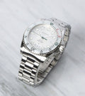  Shop Authentic Gucci Dive Quartz White Dial Silver Steel Strap Watch For Men - YA136336 - Luxxuri