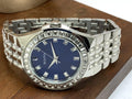  Shop Authentic Bulova Phantom Baguette Crystal Blue Dial Silver Steel Strap Watch for Men - 96A254 - Luxxuri