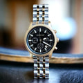  Shop Authentic Michael Kors Hutton Chronograph Black Dial Two Tone Steel Strap Watch For Men - MK8954 - Luxxuri