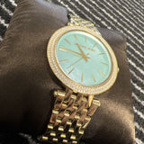  Shop Authentic Michael Kors Darci Analog Mother of Pearl Green Dial Gold Steel Strap Watch For Women - MK3498 - Luxxuri