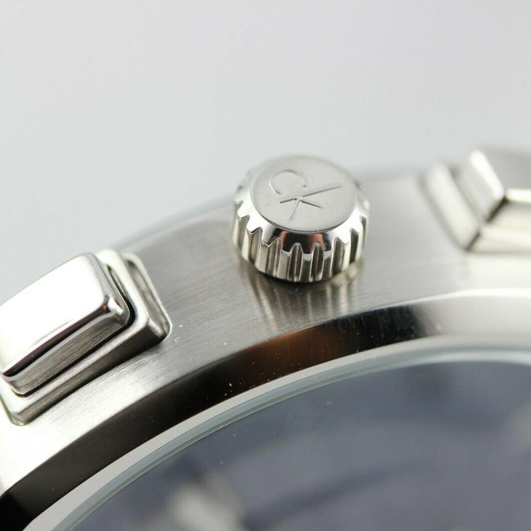  Shop Authentic Calvin Klein Chronograph Blue Dial Black Leather Strap Watch for Men - K8Q371CN - Luxxuri