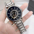  Shop Authentic Emporio Armani Meccanico Automatic Skeleton Black Dial Silver Steel Strap Watch For Men - AR60021 - Luxxuri